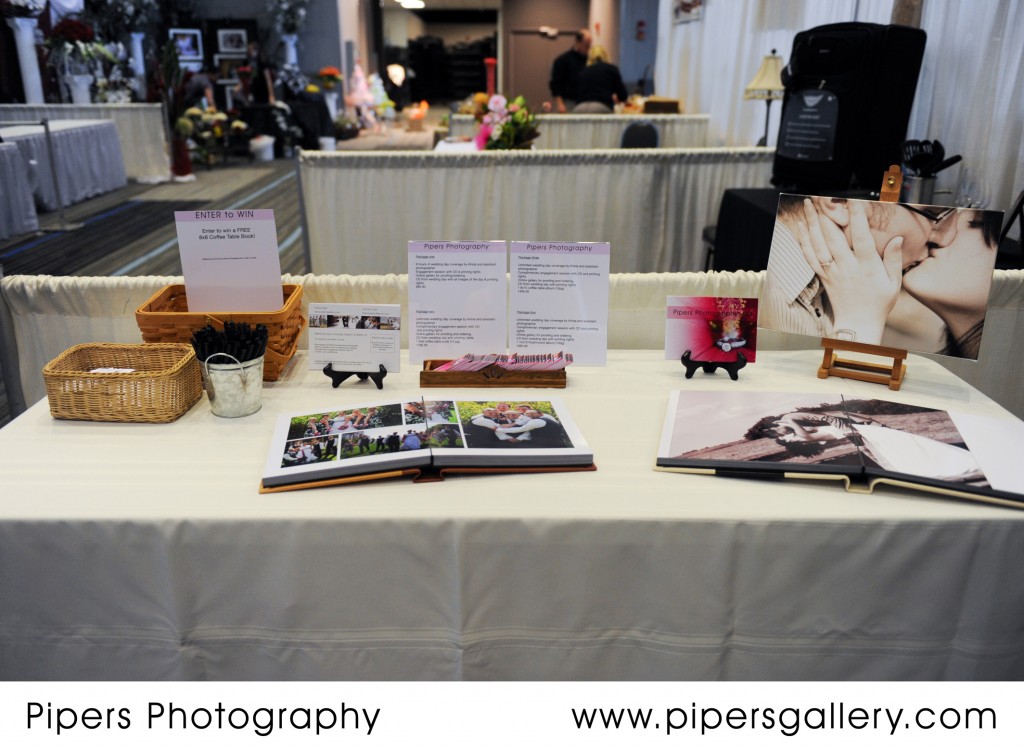 full table ( 10x10 album, 12x12 album, canvas) - The Columbus Bridal show - Pipers Photography