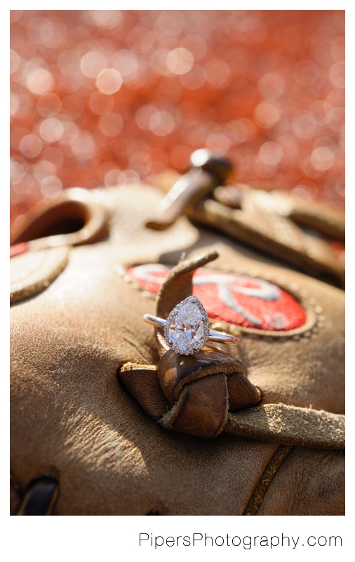 An Ohio State Baseball player and baseball inspired Columbus Engagement session at The Ohio State University  Pear Engagement Ring by Pipers Photography Krista Piper  