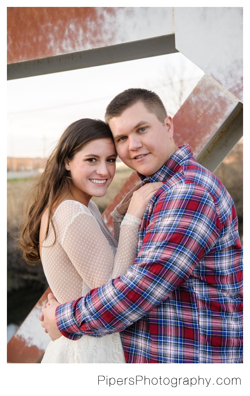 An outdoor country inspired engagement session in Sugar Grove Ohio in corn fields and bridges in the town of Sugar Grove Ohio by Pipers Photography Krista Piper 