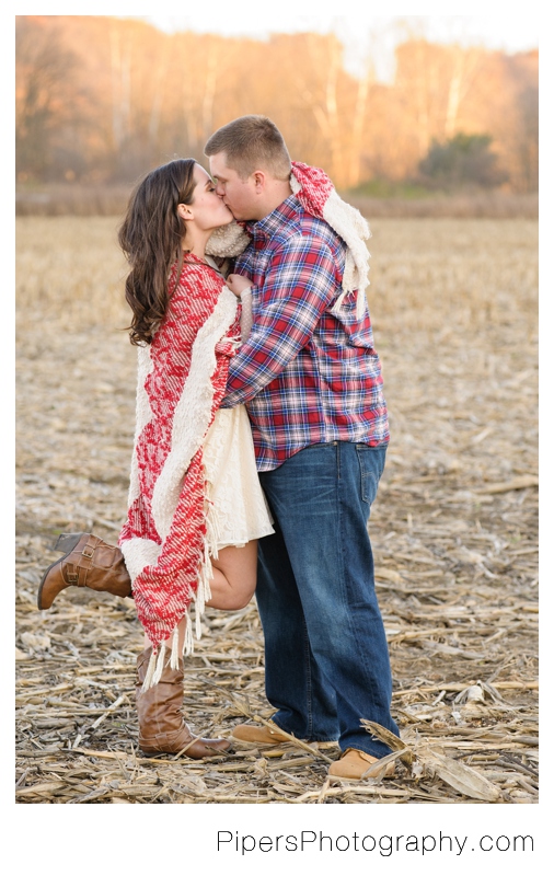 An outdoor country inspired engagement session in Sugar Grove Ohio in corn fields and bridges in the town of Sugar Grove Ohio by Pipers Photography Krista Piper 