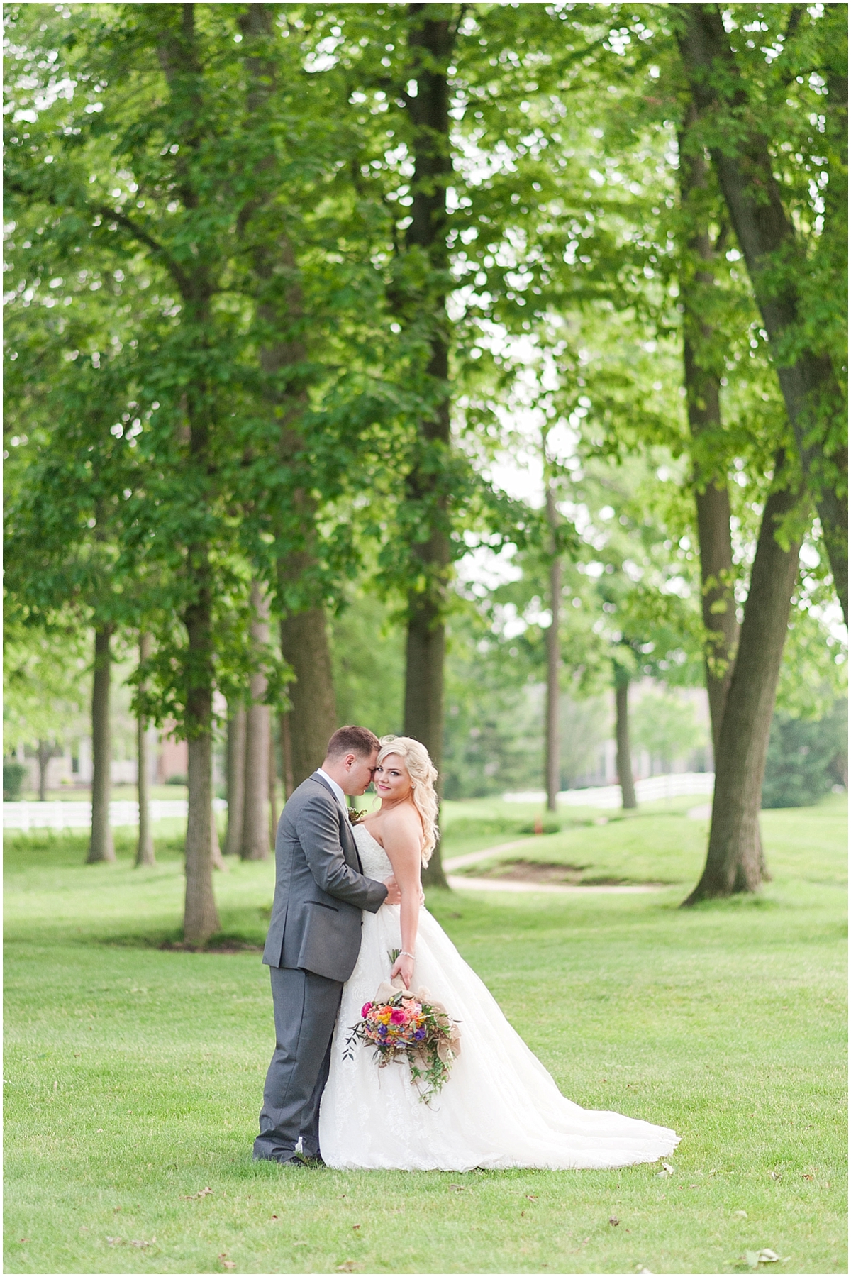 Heritage Golf Club Wedding Hilliard Ohio elegant wine inspired outdoor bride and groom portraits on a golf course Hilliard ohio wedding photographer pipers photography