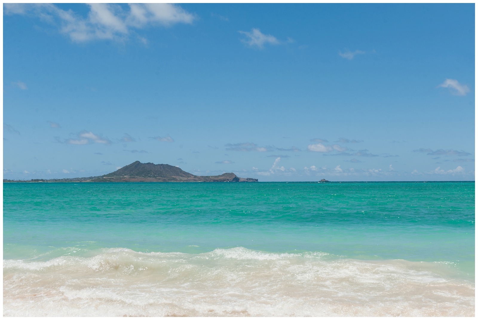 the best beach in all of Oahu Kailua Beach turquoise waters with white sandy beaches and blue skies hawaii oahu vacation
