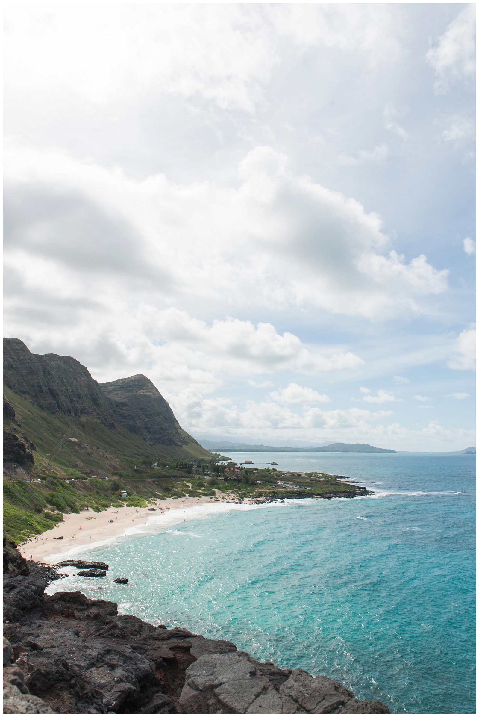 Vertical photo of Makapu-u Lookout looking over the beach and the cliffs on O'ahu Hawaii and ocean 