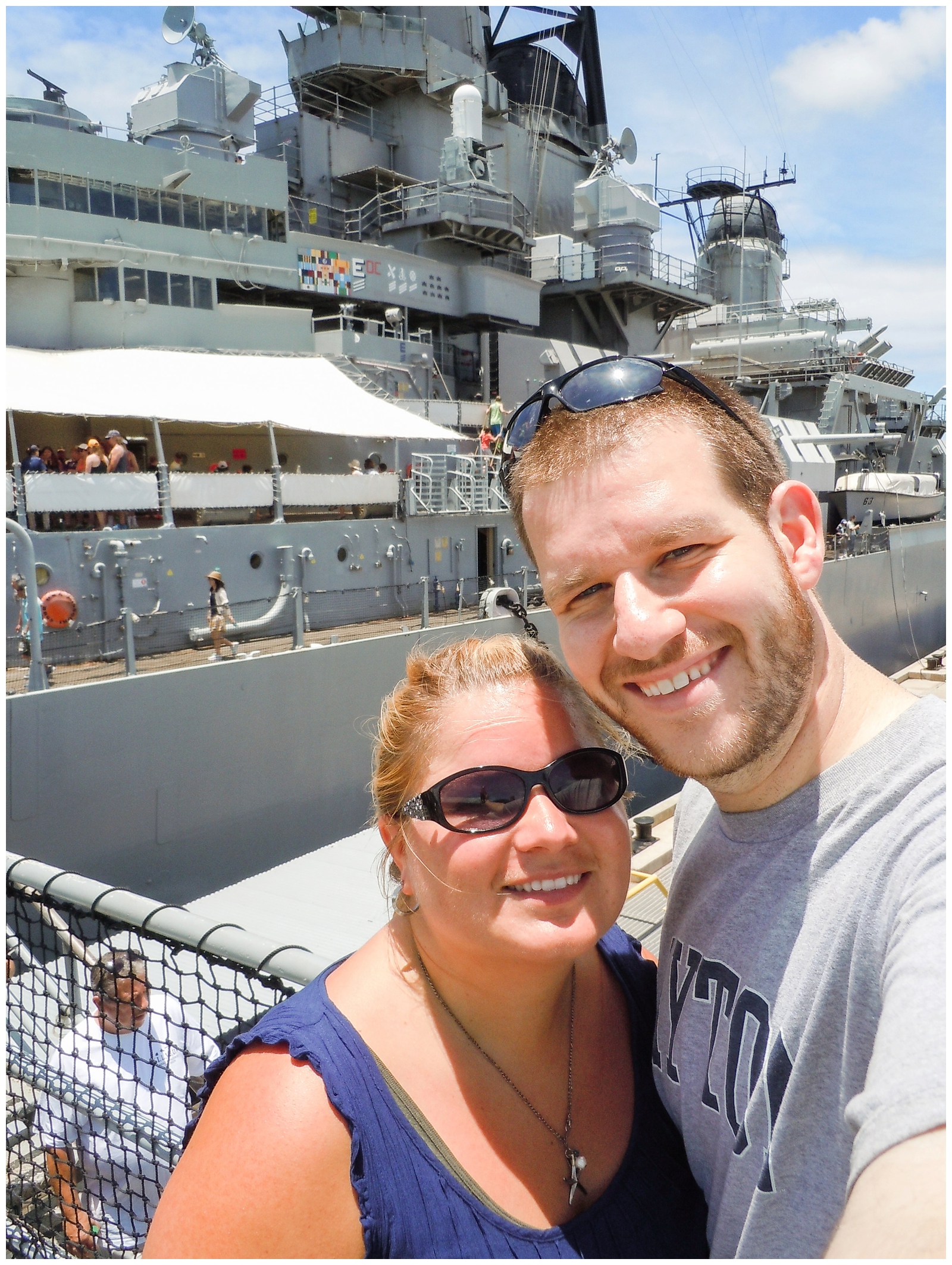 Krista and Scott standing outside USS Missouri hawaii oahu vacation june tourist guide coastal drive and pearl harbor