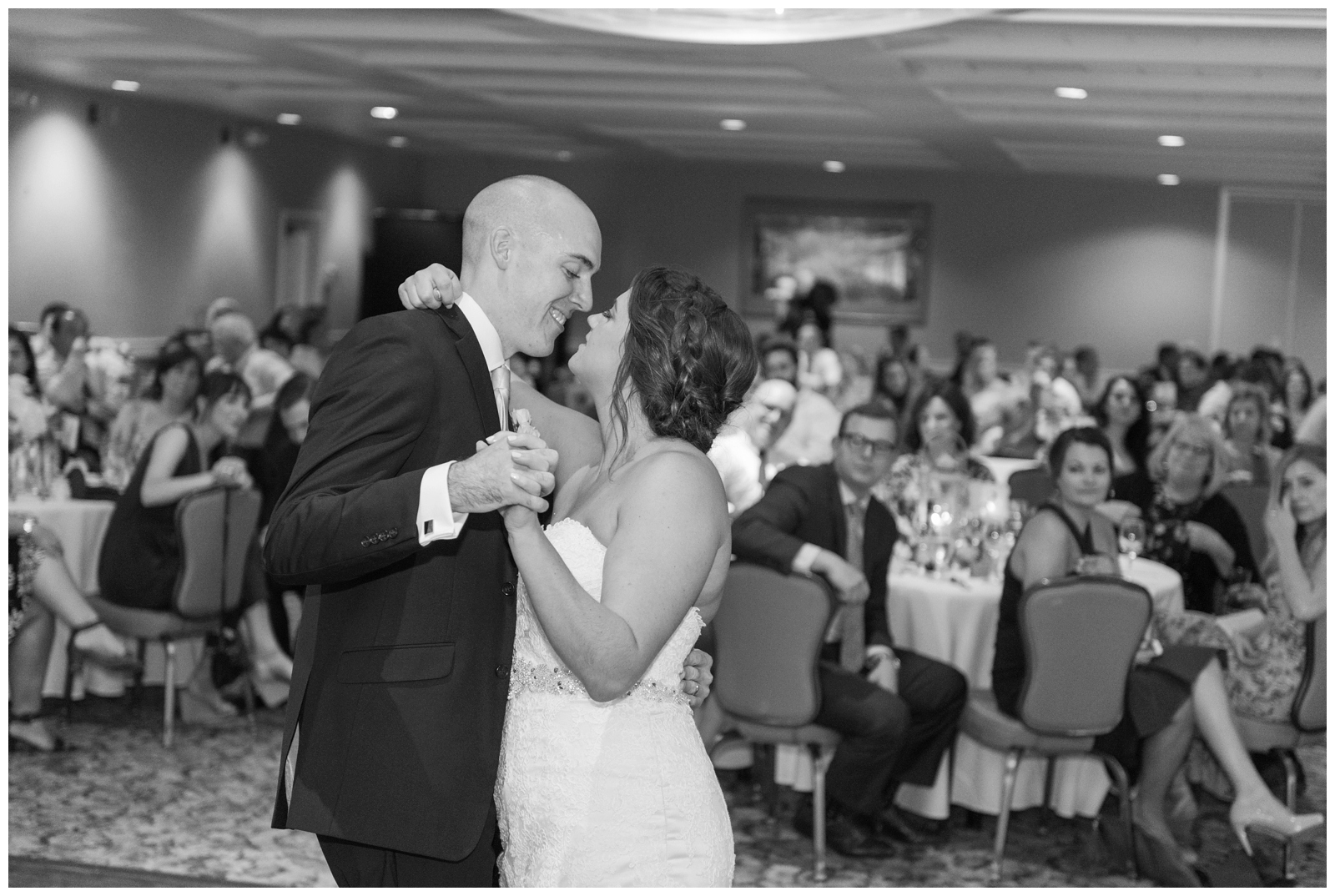 black and white portrait of newlyweds dancing first dance during Ohio wedding day