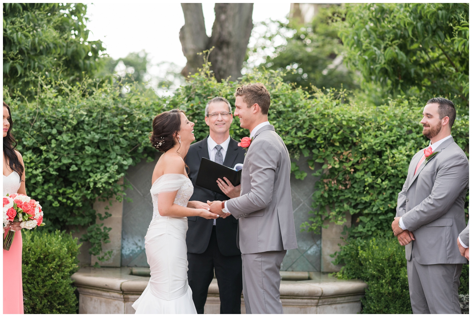 bride and groom laugh together during vow exchange at Franklin Park Conservatory garden wedding
