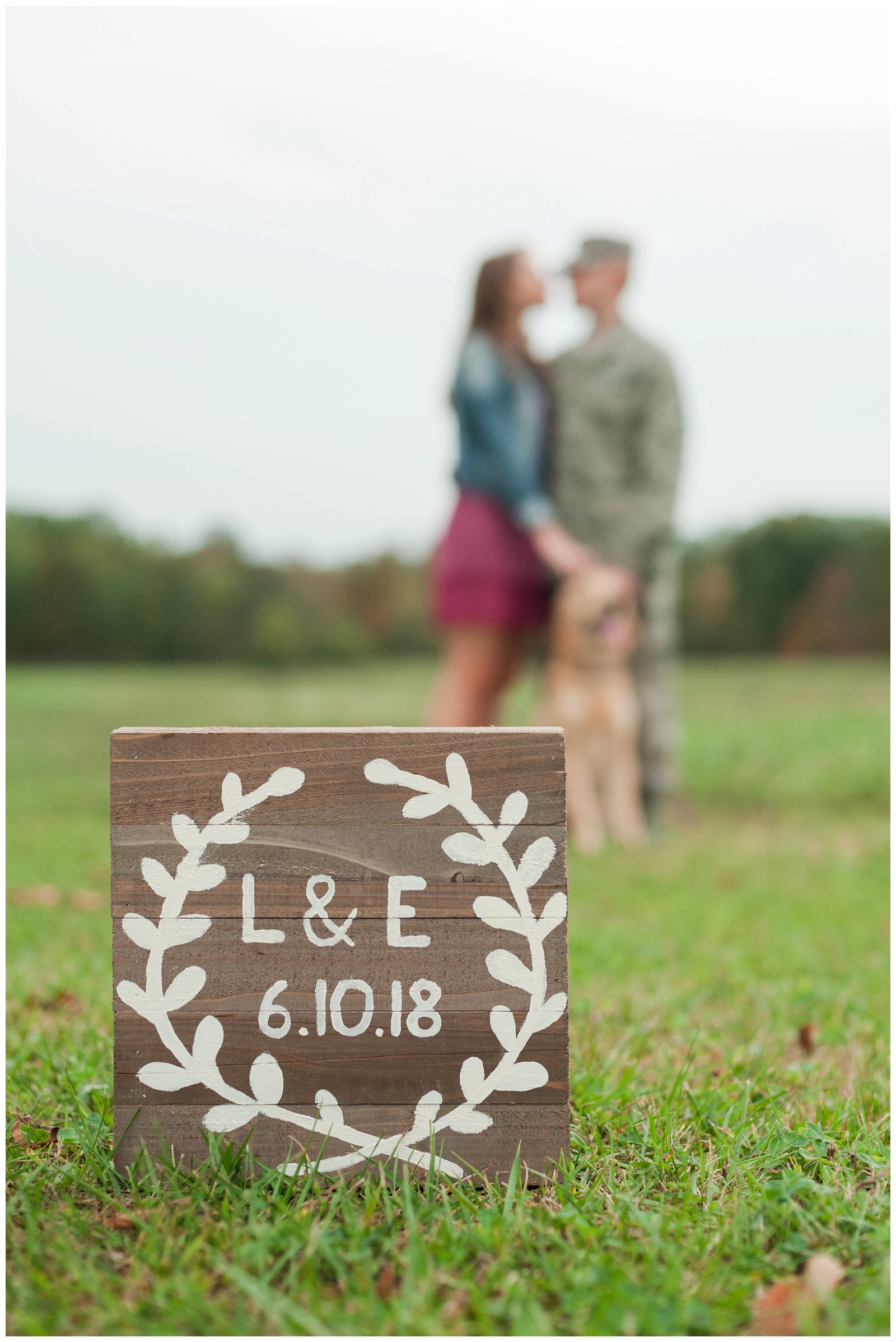 save the date sign for engaged couple 