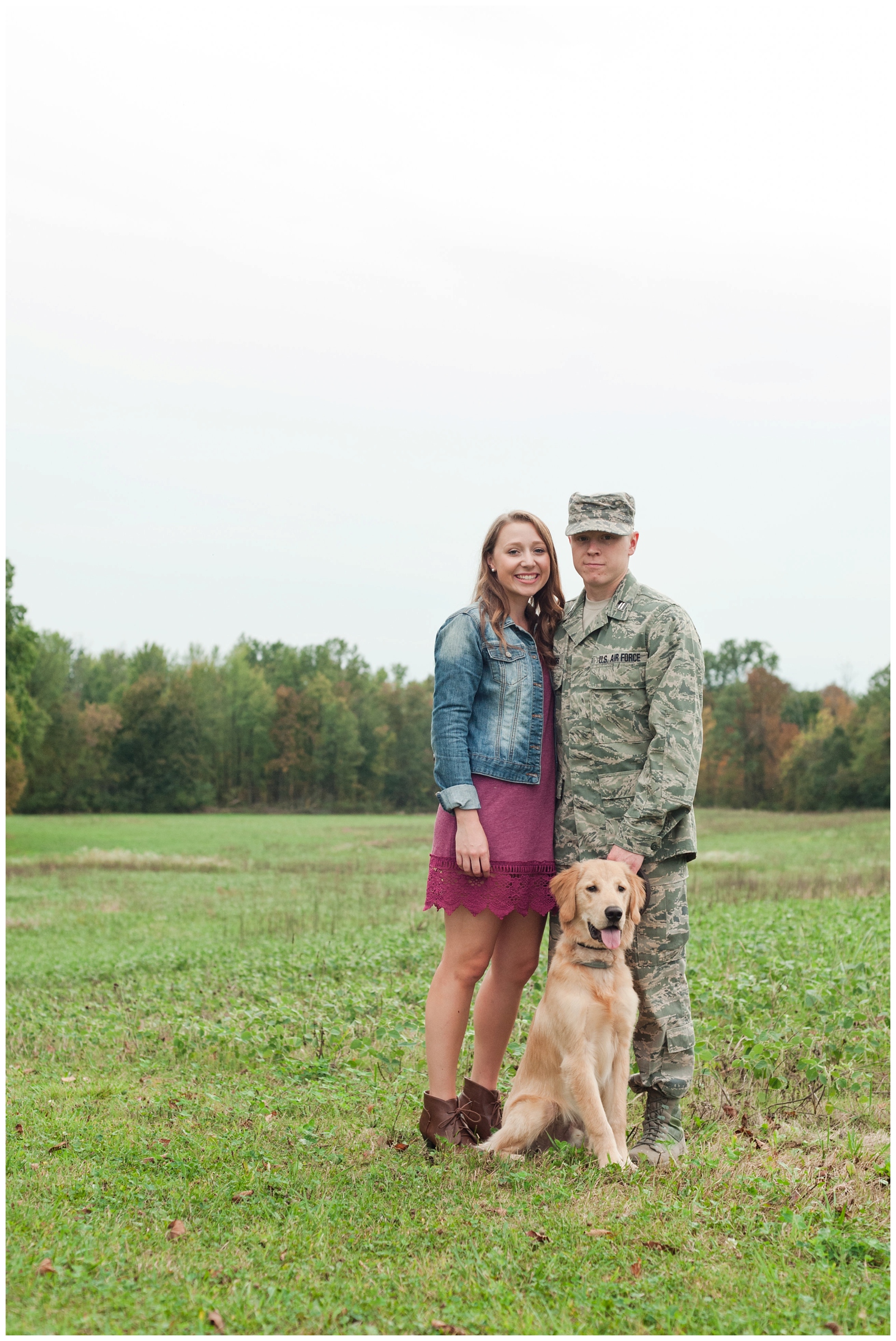 engaged couple and dog smiling at camera during country engagement session in the fall time in sunbury ohio 