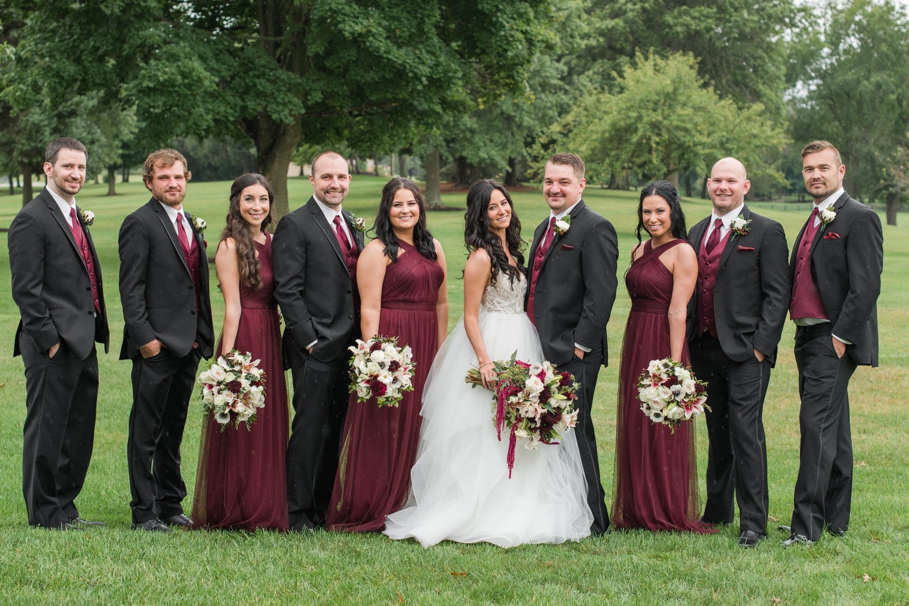 wedding party in black and burgundy at brookside farm in louisville ohio 