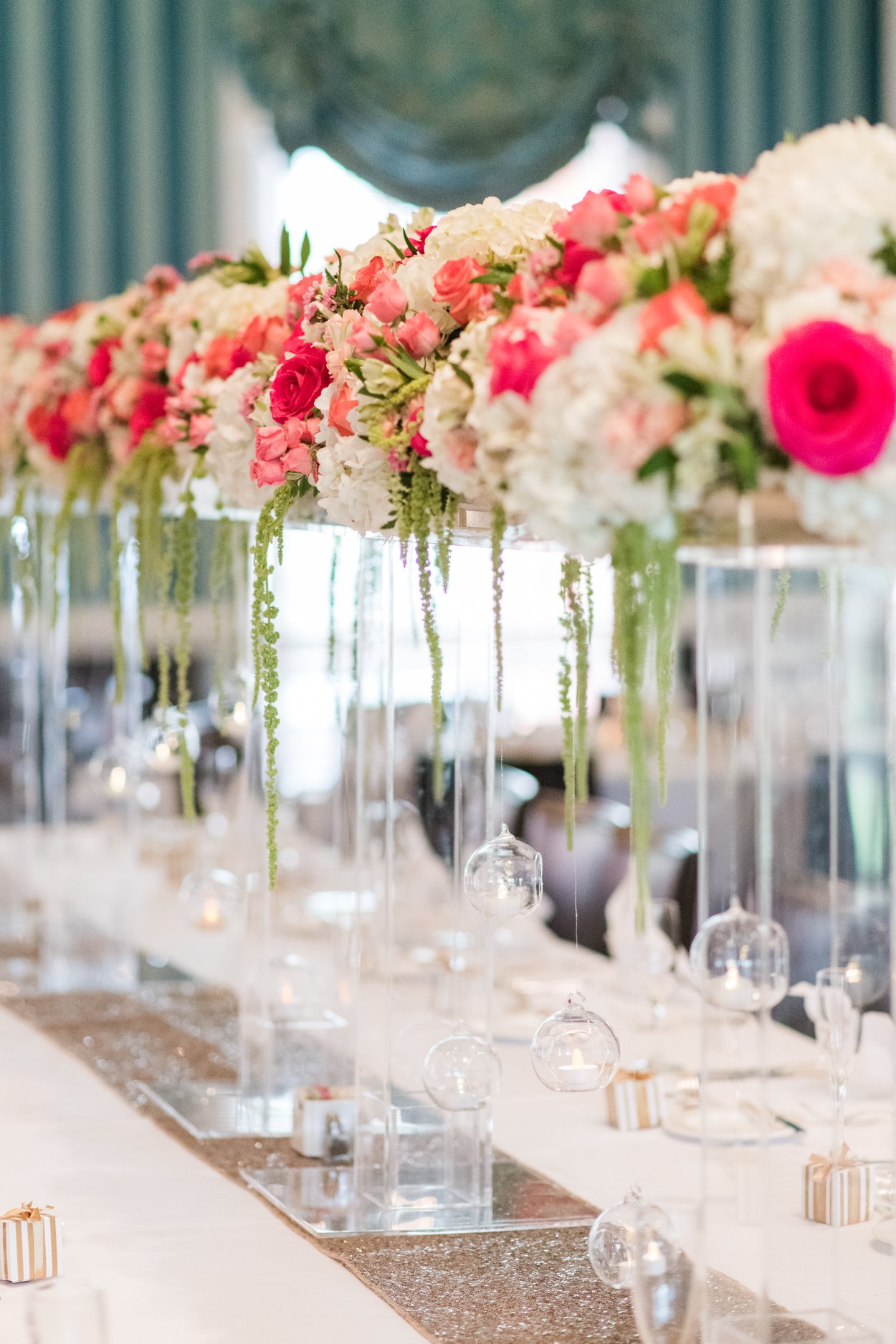 elegant wedding centerpiece with acrylic at the new albany country club with pink and white flowers and greenery 