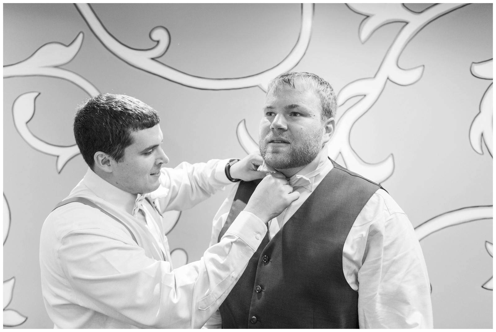 groom prepares for EagleSticks Golf Club wedding day with groomsman
