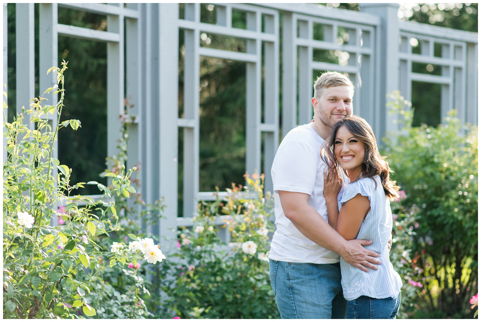 engaged couple happily looking and smiling at the camera during their engagement session at Inniswood metro gardens Engagement Session in Westerville Ohio 