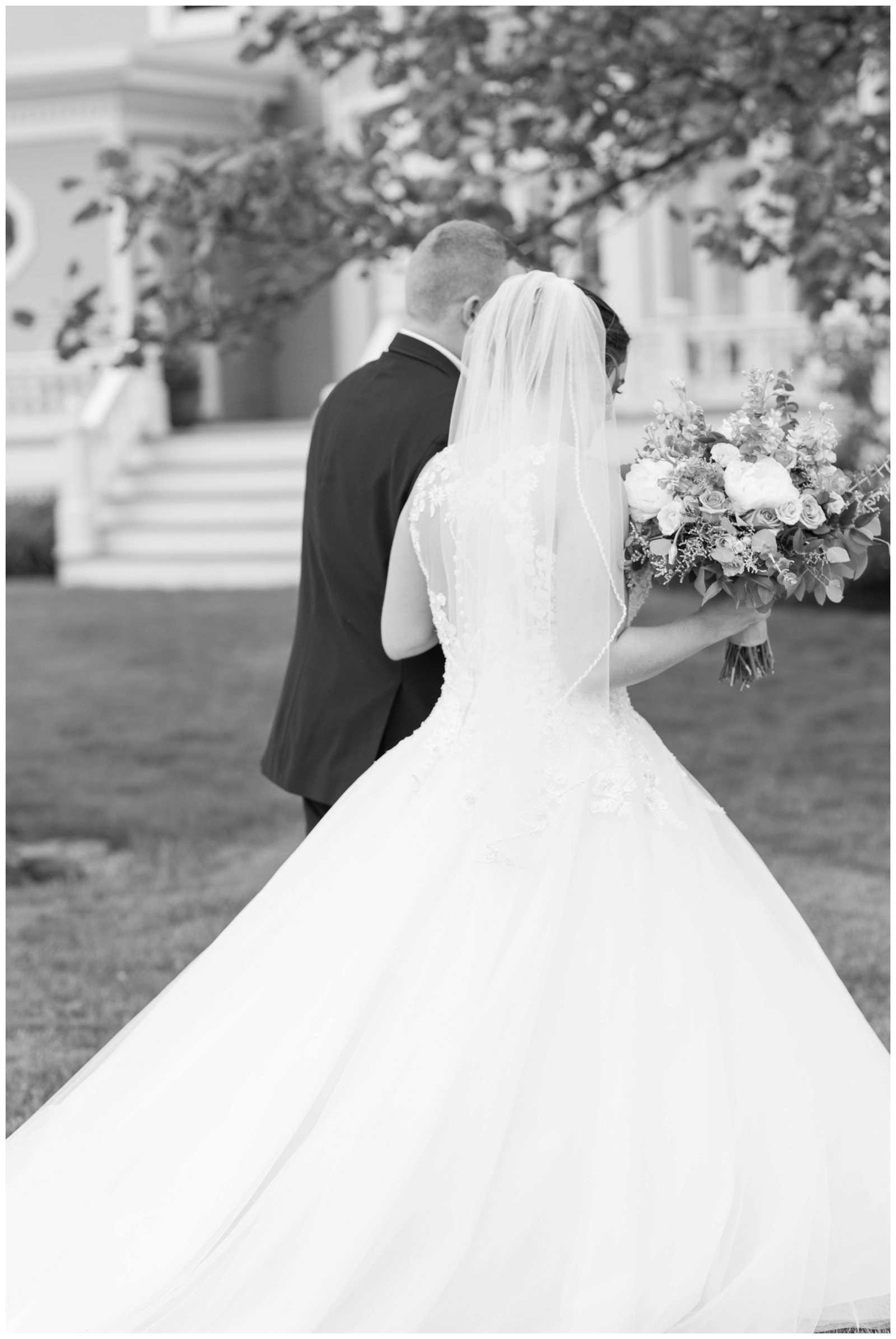 bride and groom leave wedding ceremony photographed by Pipers Photography