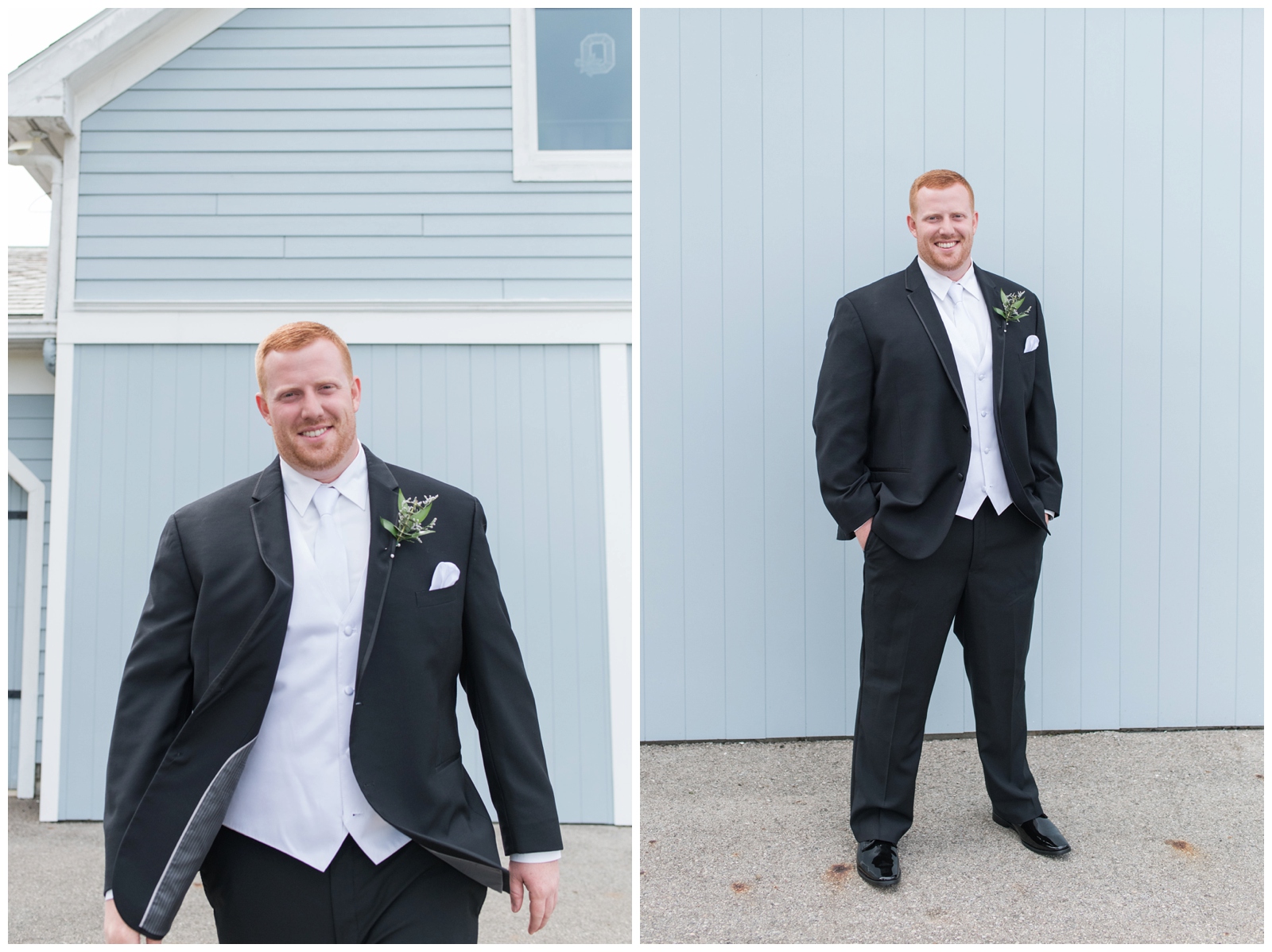 groom in black suit with green boutonnière smiles at camera and poses next to blue wall at Pretty Prairie Farms