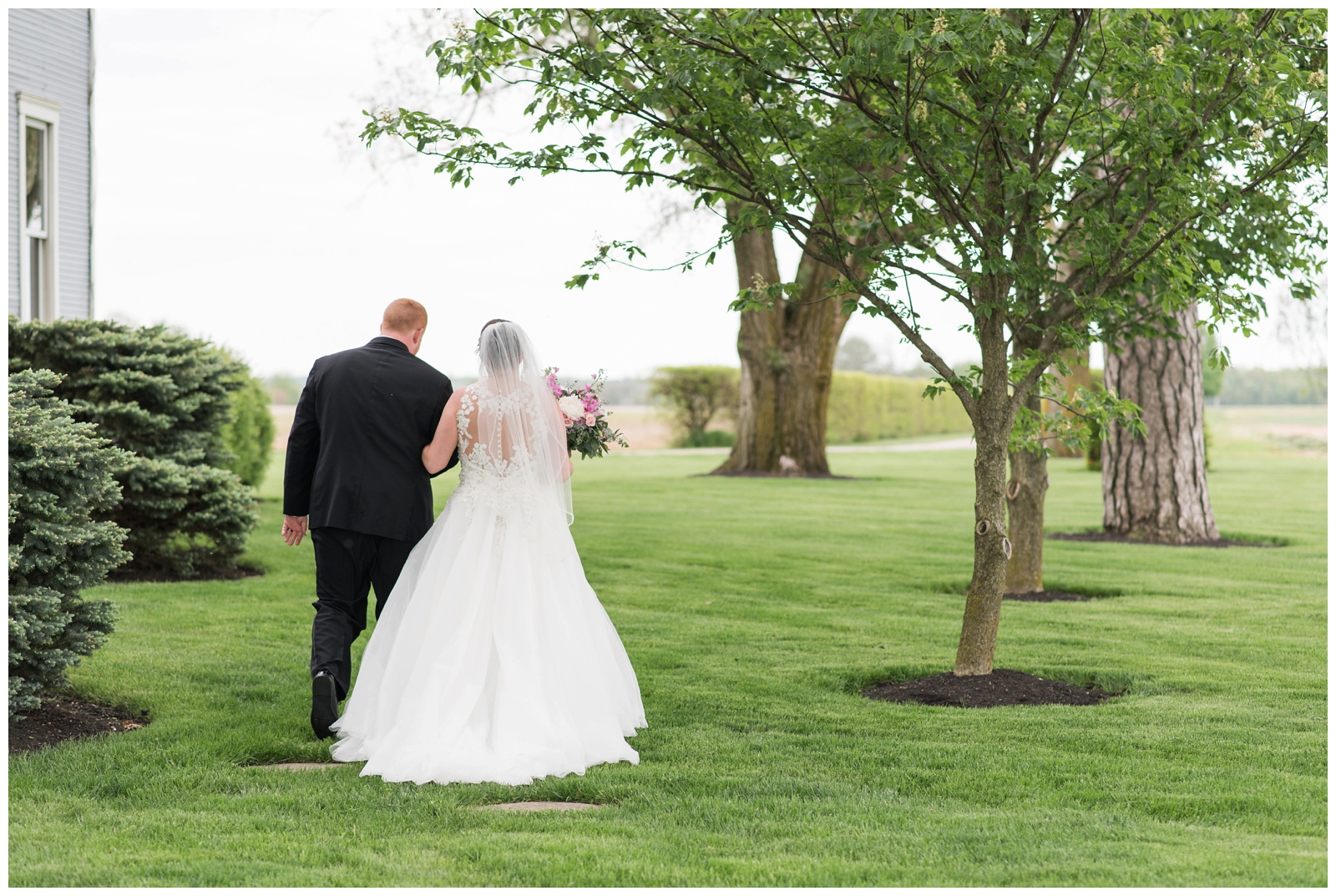 bride and groom talk after wedding ceremony at Pretty Prairie Farms