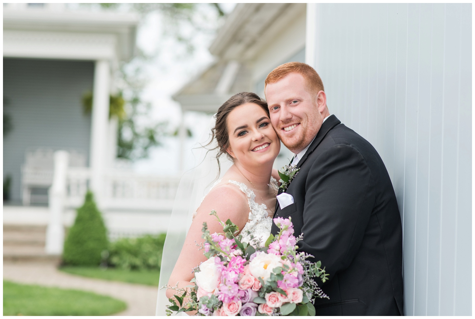 Ohio newlyweds pose on Pretty Prairie Farms with Pipers Photography