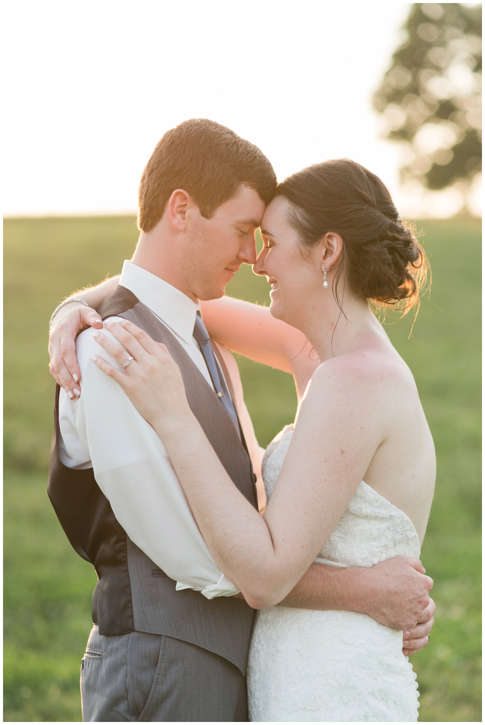 bride and groom almost kissing at sunset at harvest adventures in bremen ohio