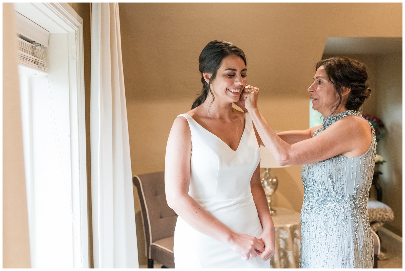bride's mother helps with earrings on Ohio wedding day at Brookside Golf and Country Club 