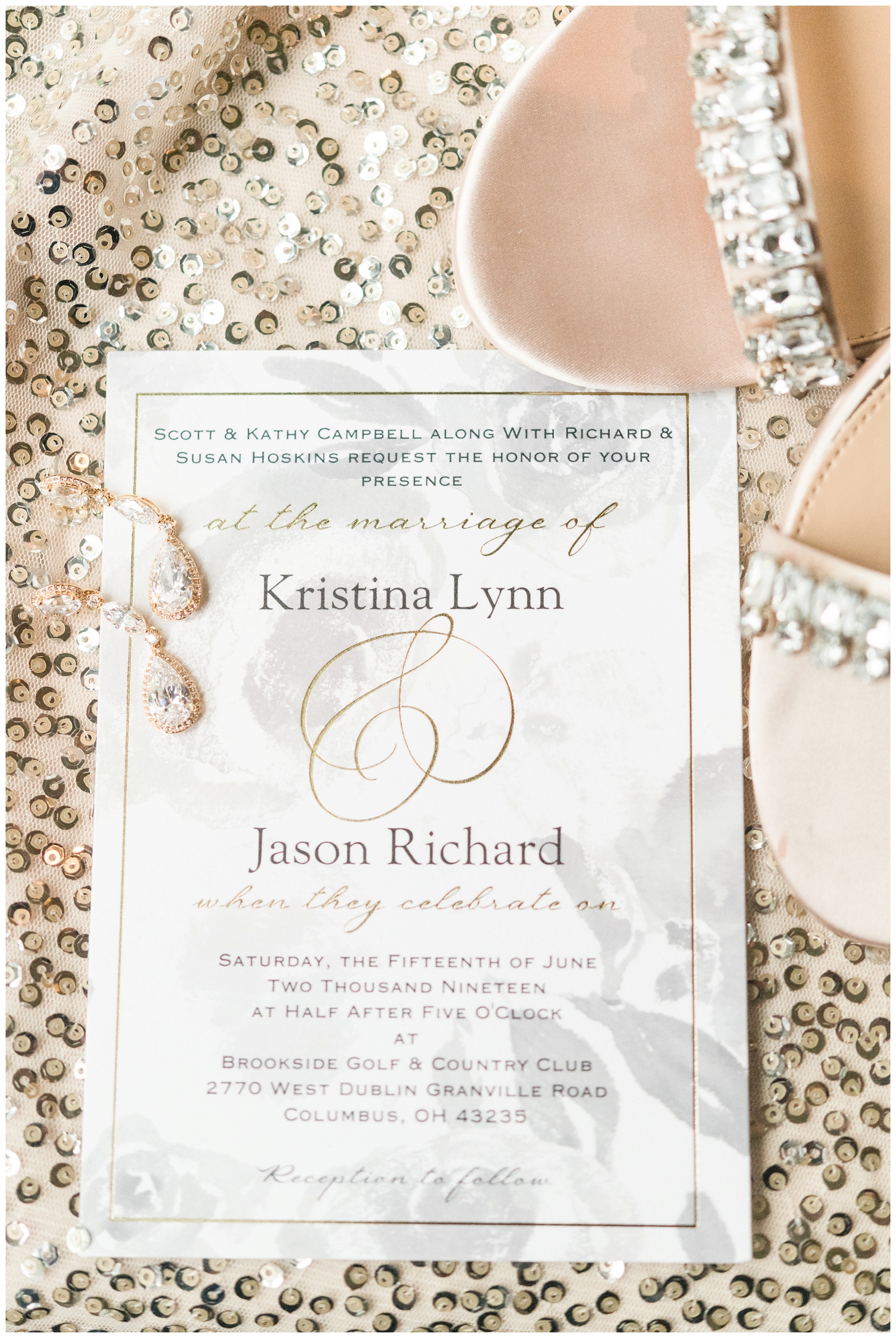 classic gold and ivory wedding invitation suite for Ohio wedding day photographed with bride's shoes