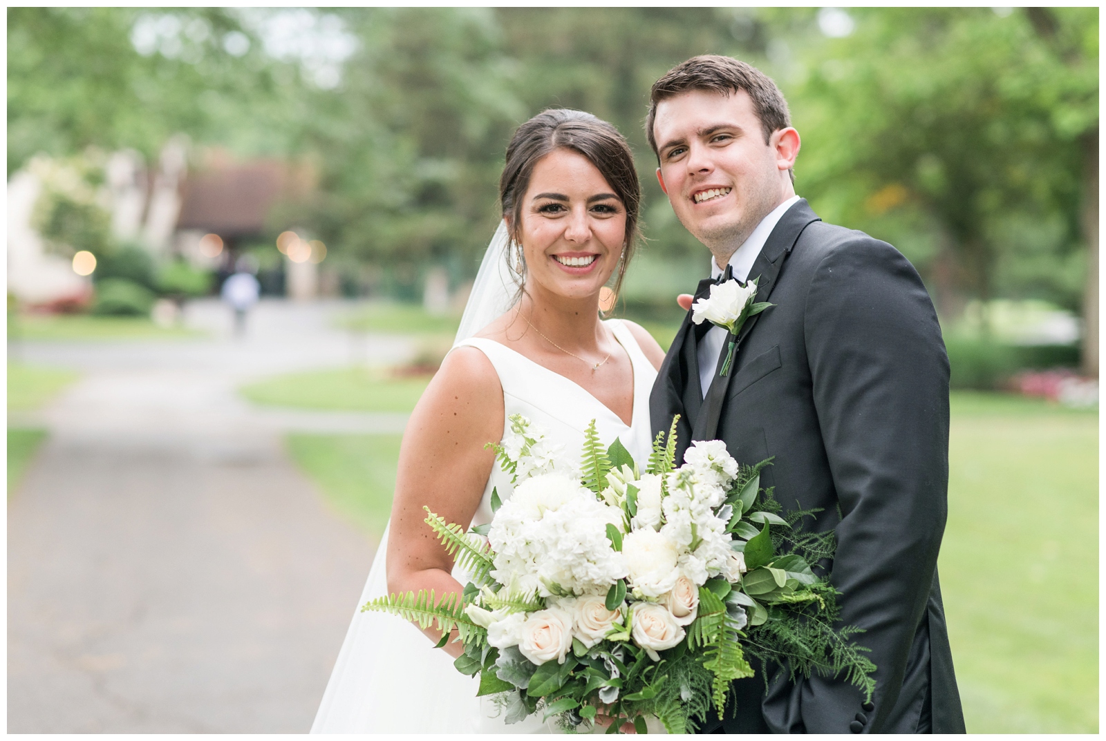 bride and groom smile for Pipers Photography at Brookside Golf and Country Club 