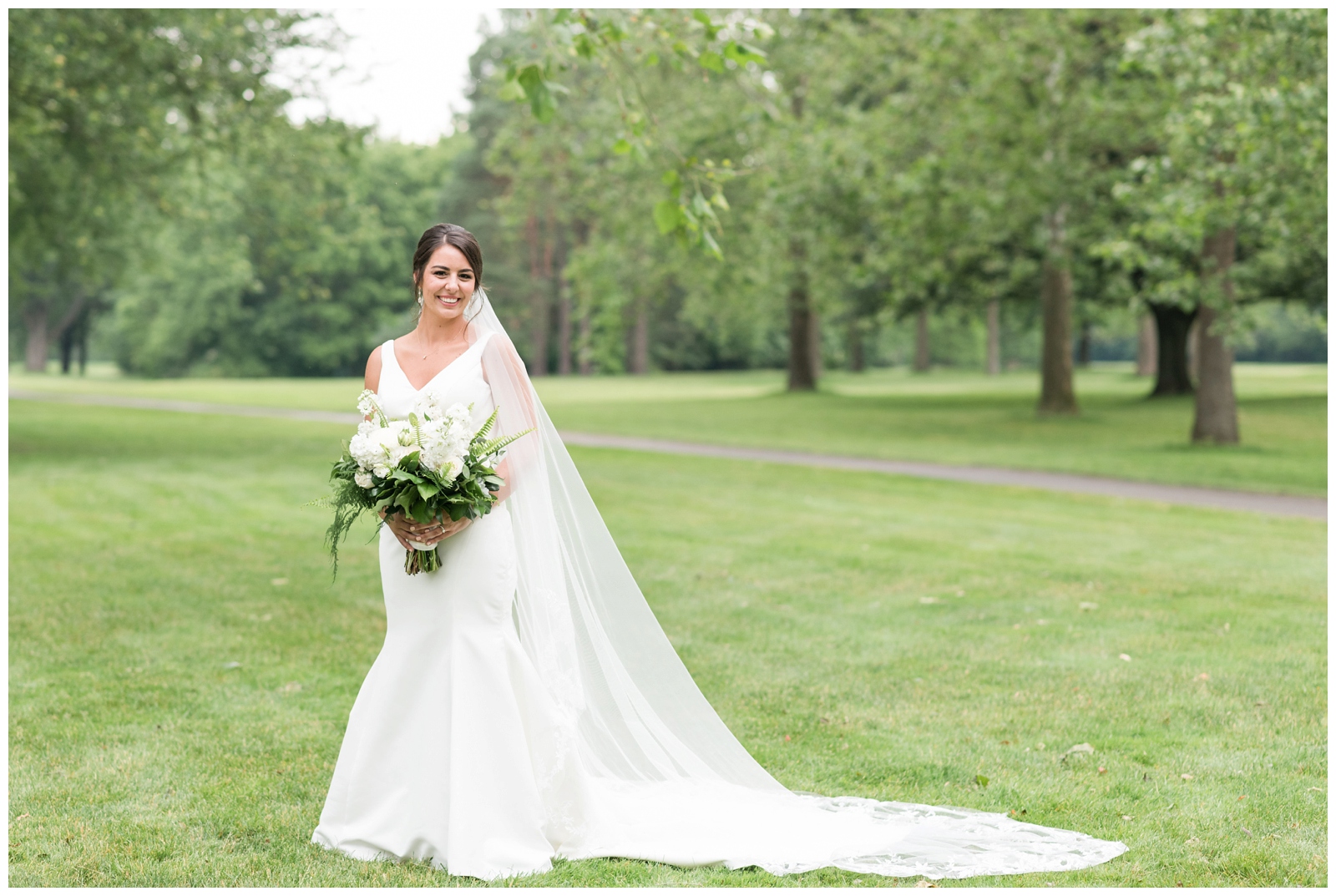 bridal portrait on grass at Brookside Golf and Country Club 