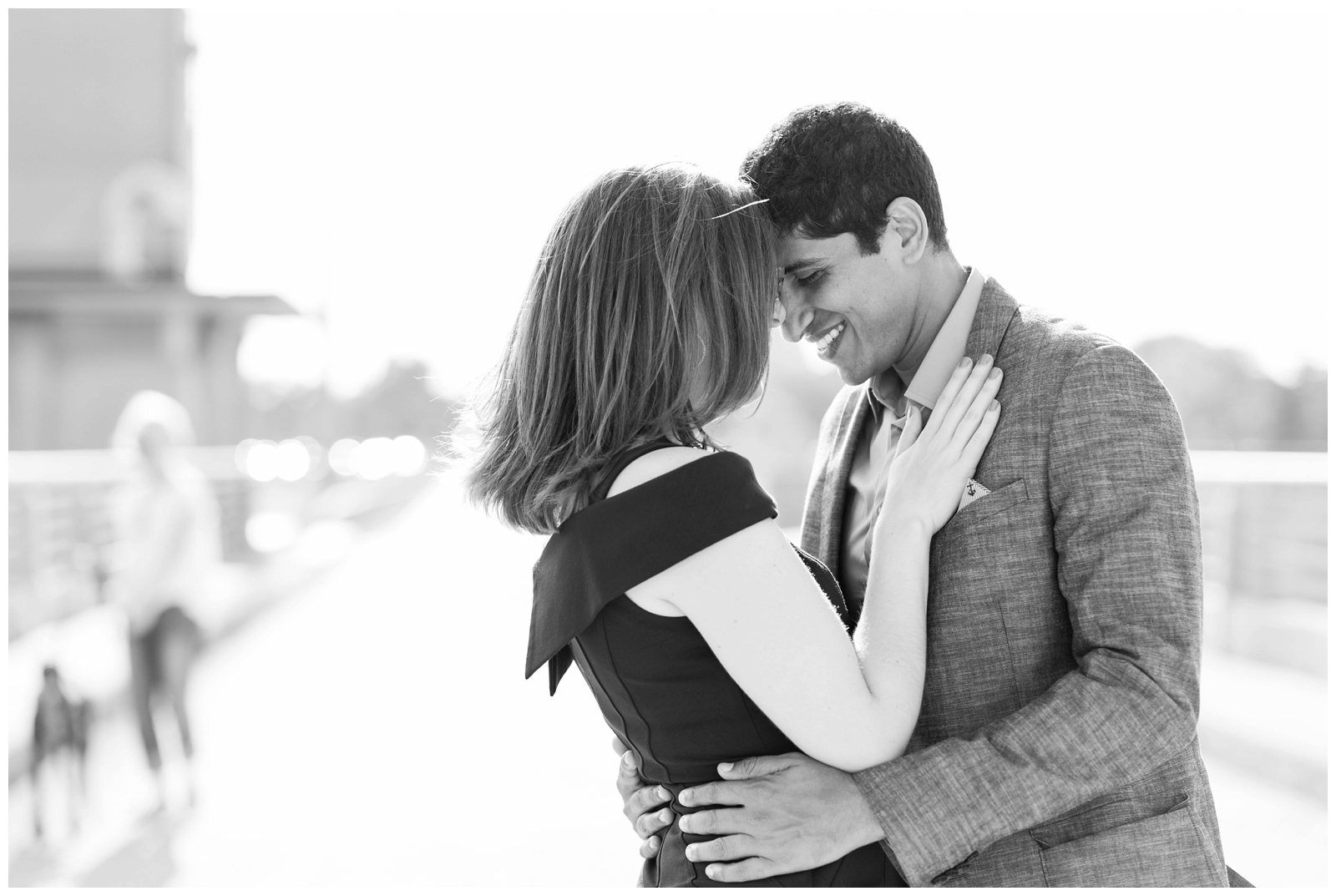 black and white engagement portrait of couple hugging in Ohio