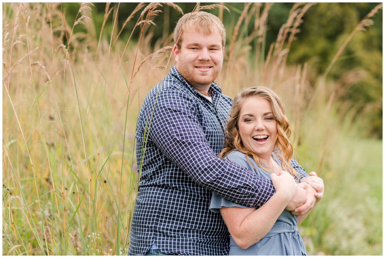 engagement portraits in fields at Dawes Arboretum in Newark OH