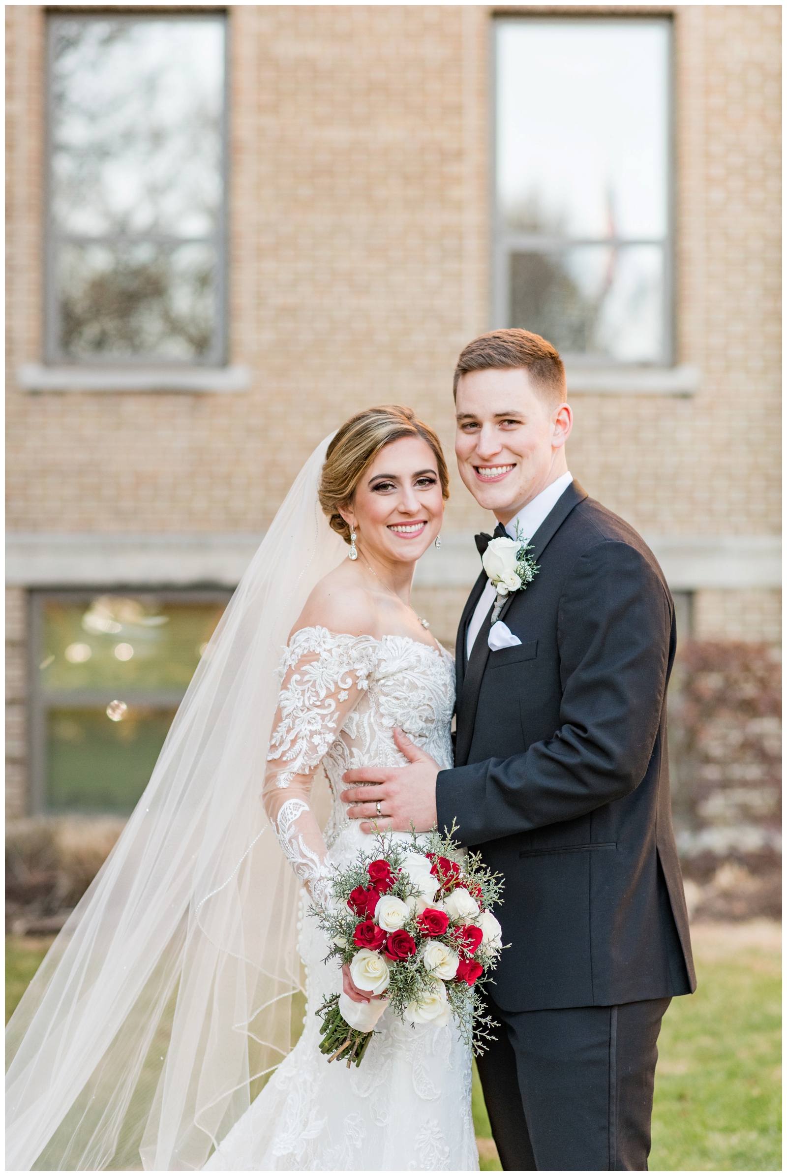 Columbus OH newlyweds smile for St. Charles Preparatory School wedding photos