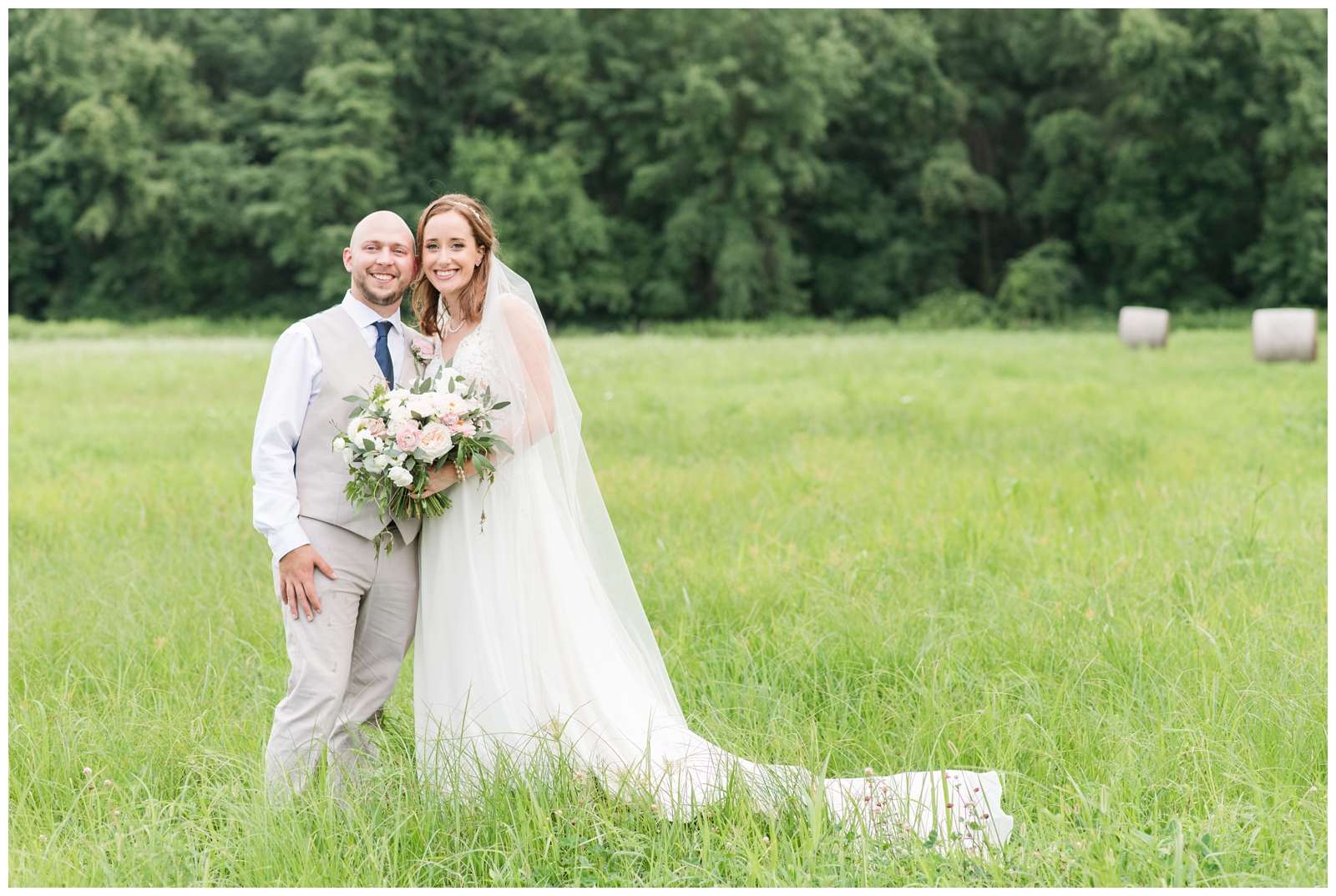 Oak Grove Jorgensen Farms wedding portraits in field of bride and groom cheek to cheek