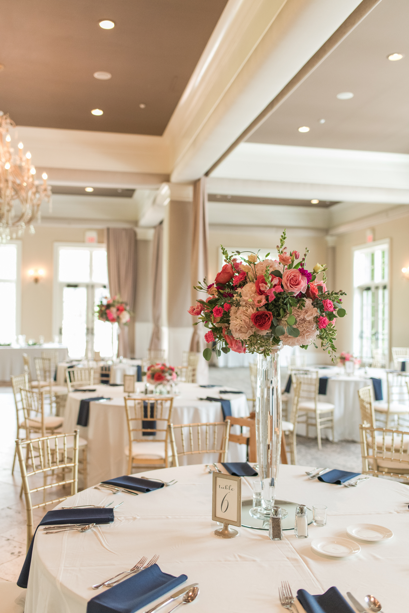 Details of a tall pink rose reception centerpiece at a Pinnacle Golf Club Wedding